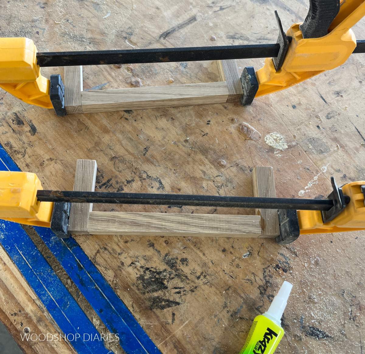 Risers in clamps on workbench