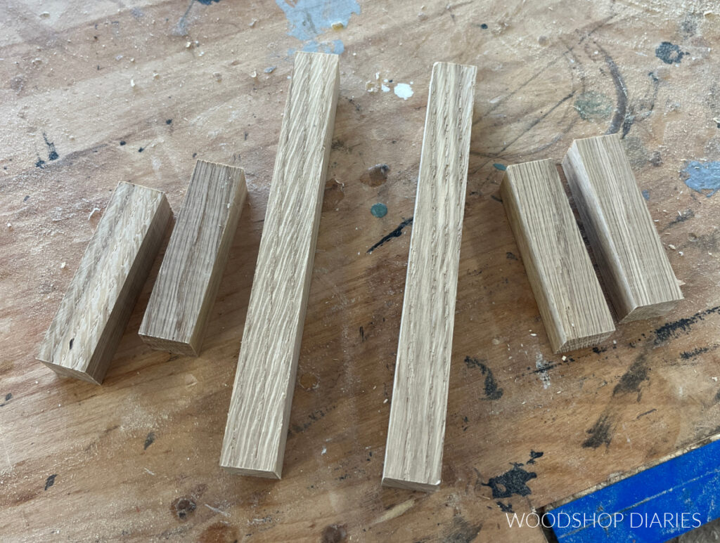 square dowel pieces cut to length for risers