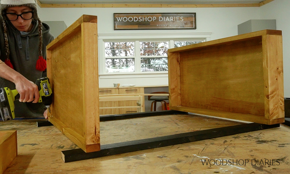 Shara Woodshop Diaries screwing top shelf to cart frame