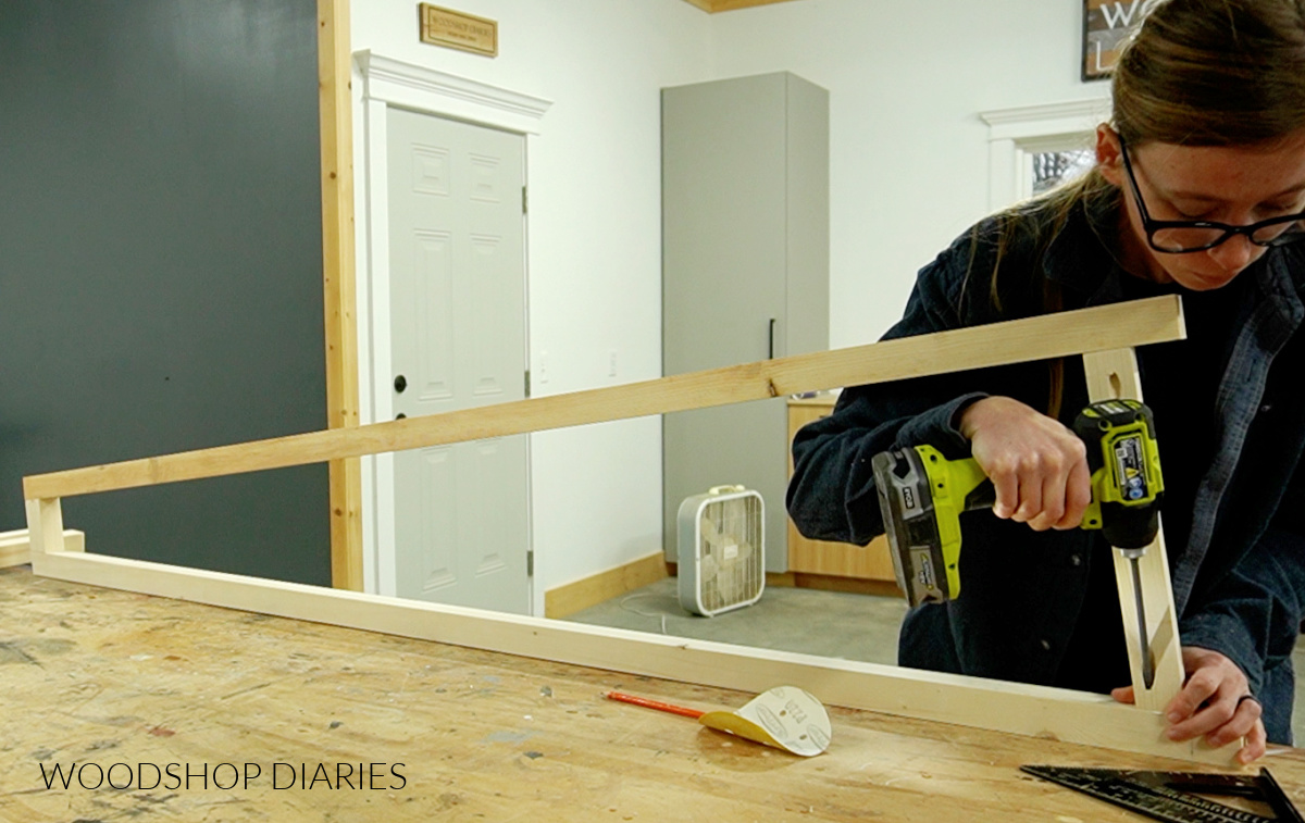 Shara Woodshop Diaries assembling side frames of bookshelf using pocket holes