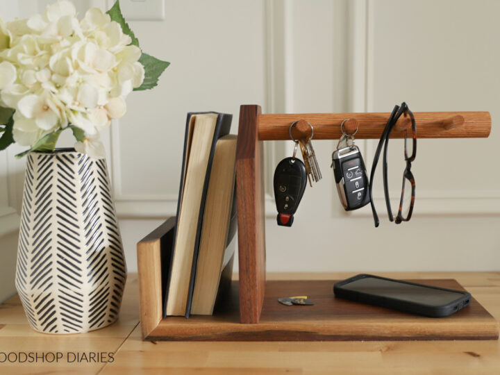 Key rack with tray outlet