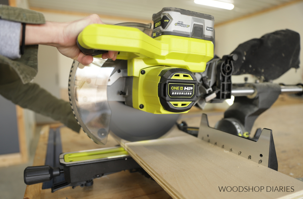 Close up of Ryobi 10" Sliding Compound miter saw on workbench