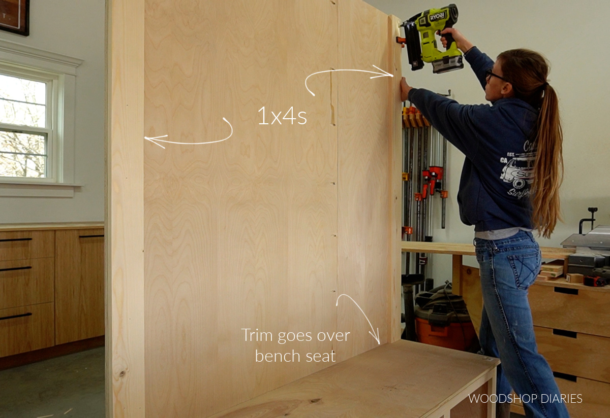 Shara Woodshop Diaries brad nailing trim pieces on back panel of hall tree coat rack panel