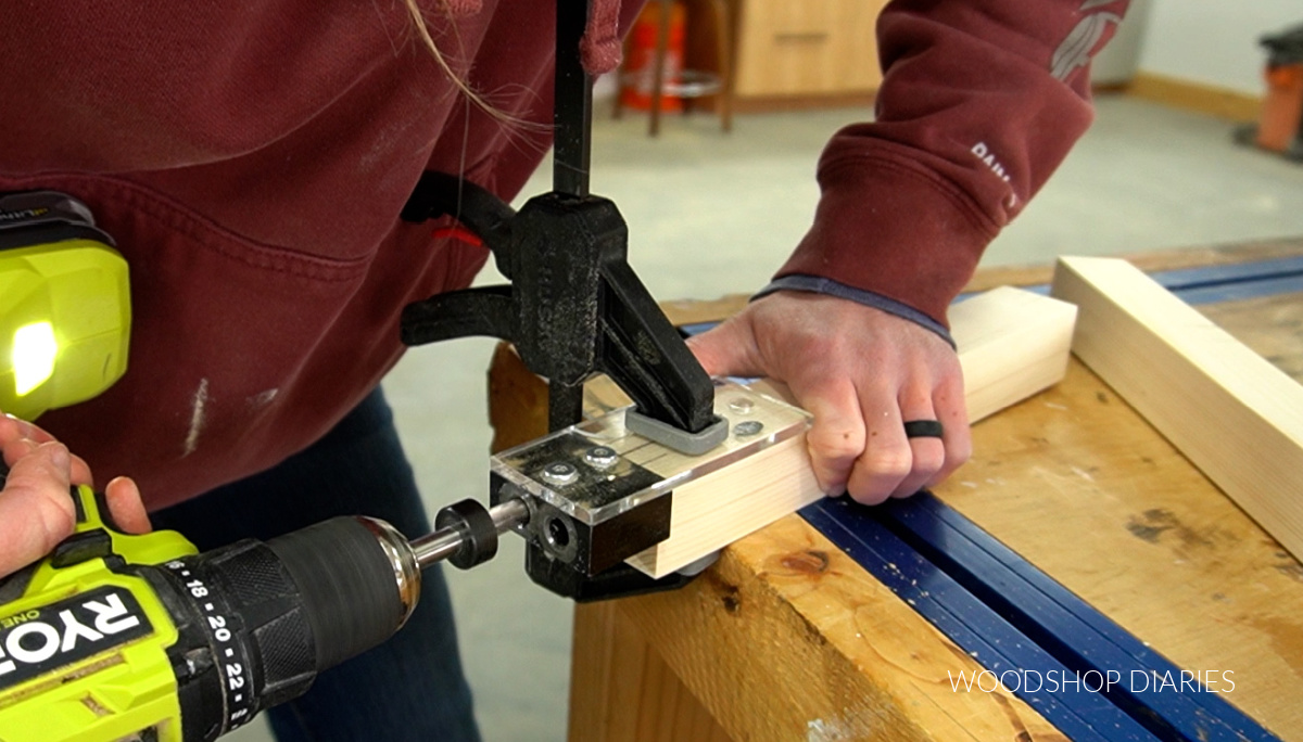 Close up of Ryobi drill drilling dowel holes using a dowel jig