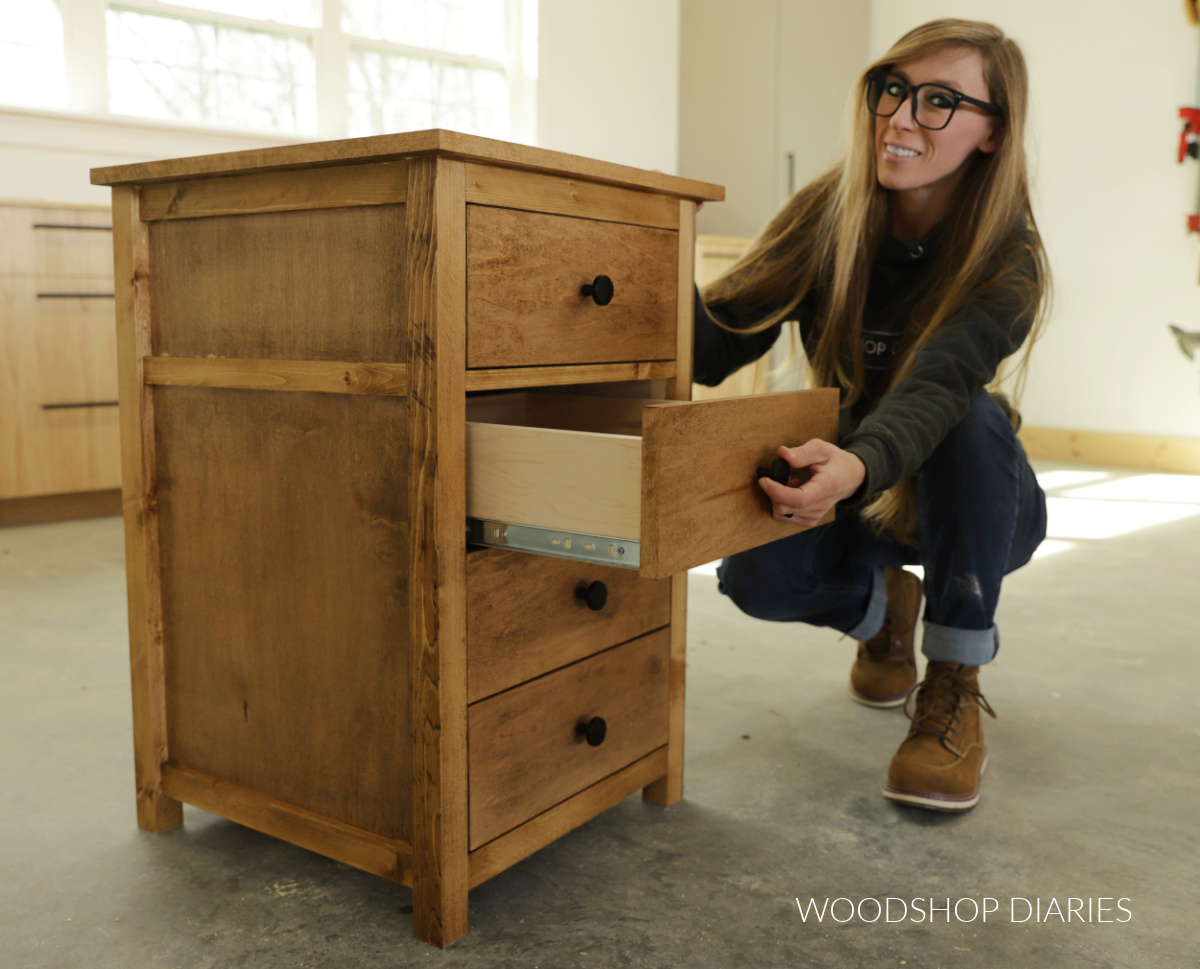 Shara Woodshop Diaries pulling drawer out of end table with 4 drawers