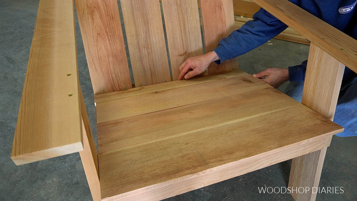 Arranging seat slats on Adirondack chair seat frame