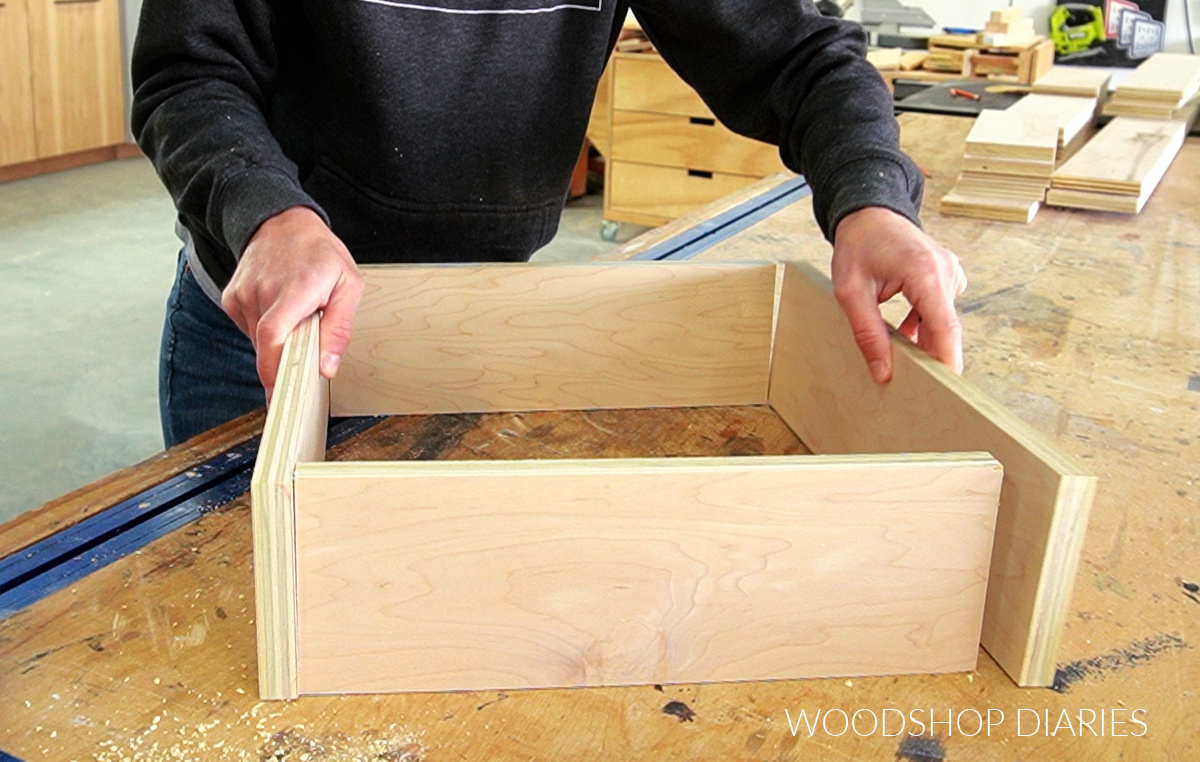 four sides of drawer box fit together on workbench