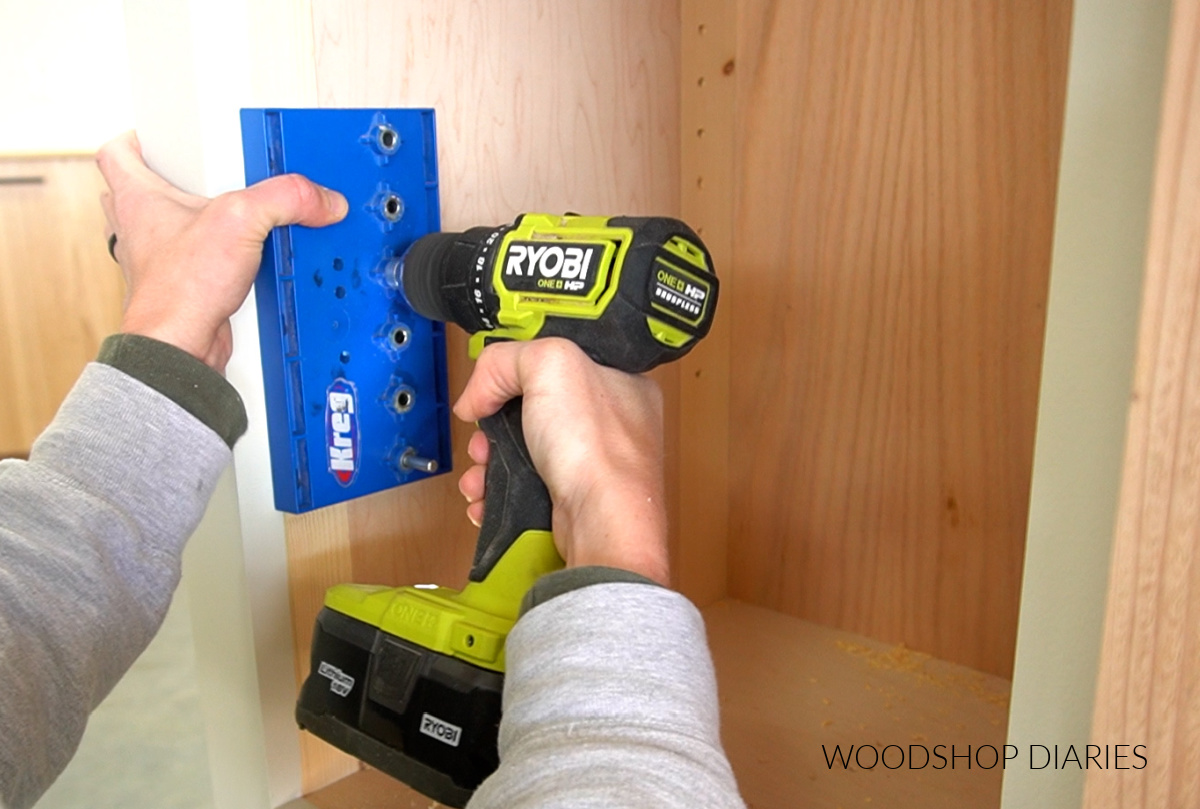 Close up of shelf pin jig used to drill shelf pin holes into cabinet