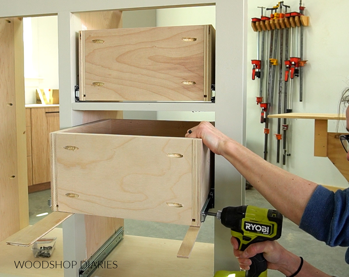Shara Woodshop Diaries installing drawer boxes into dresser cabinet