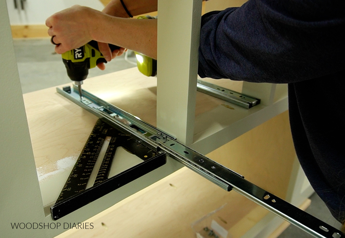 Shara Woodshop Diaries installing drawer slides into cabinet