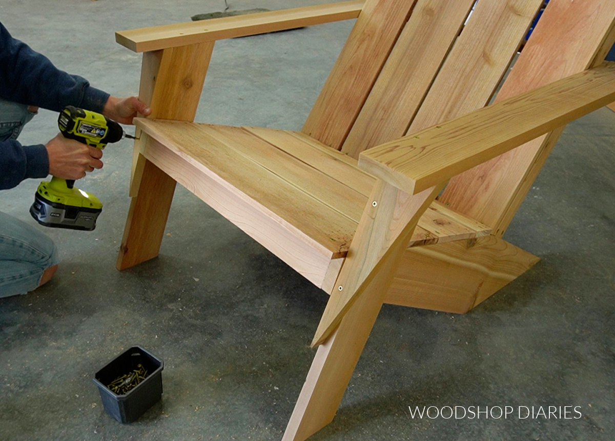 Shara Woodshop Diaries installing triangle supports underneath arm rests