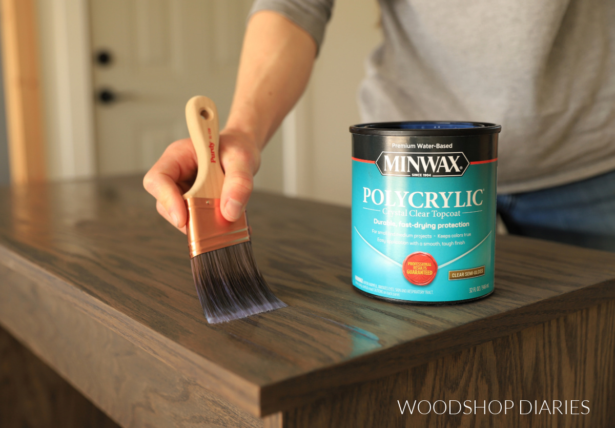 Shara Woodshop Diaries applying Minwax Polycrylic to a stained piece of furniture 