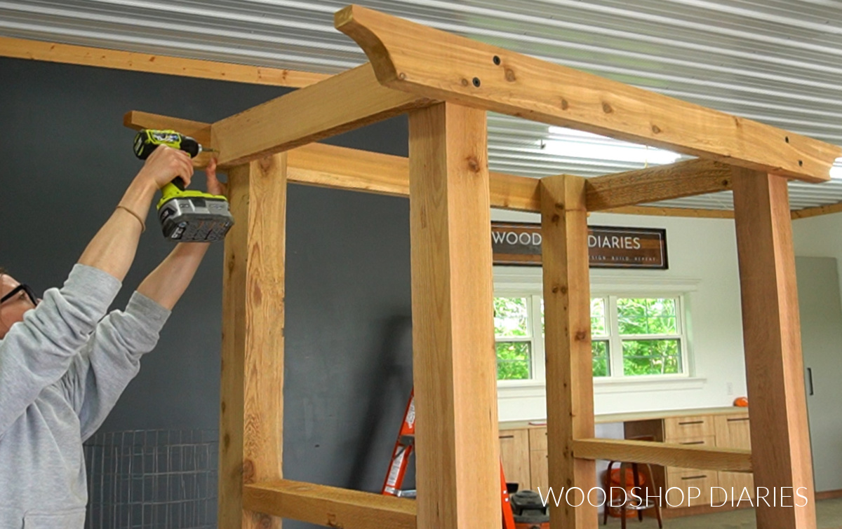 Shara Woodshop Diaries installing top supports onto arbor frame in workshop