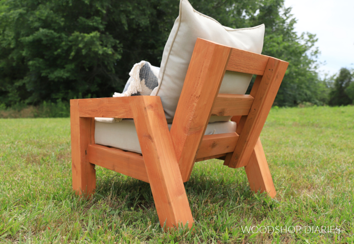 Back side of outdoor chair showing seat slats running between back posts