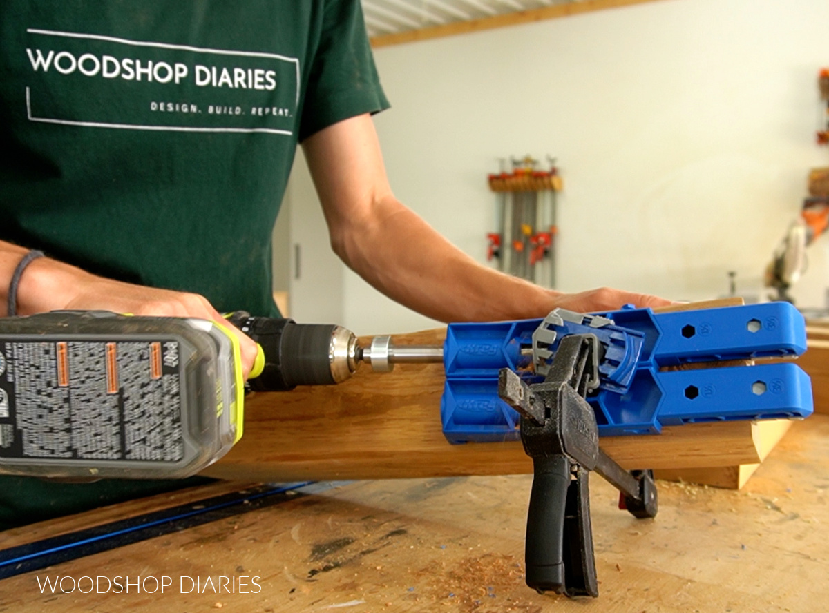 Close up of Shara Woodshop Diaries drilling pocket holes in 4x4 cedar post with Kreg XL Jig