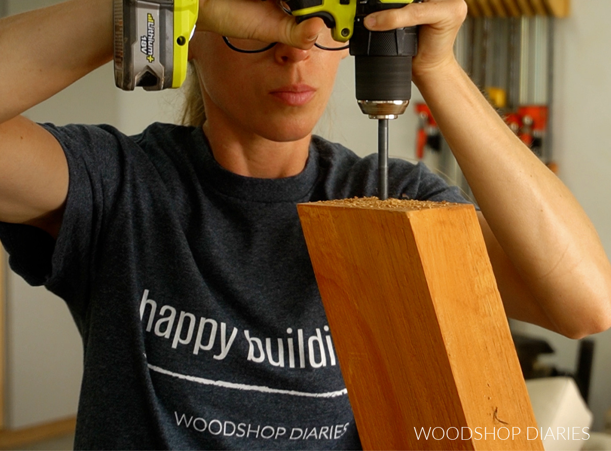 Close up of drilling a hole in bottom of chair legs