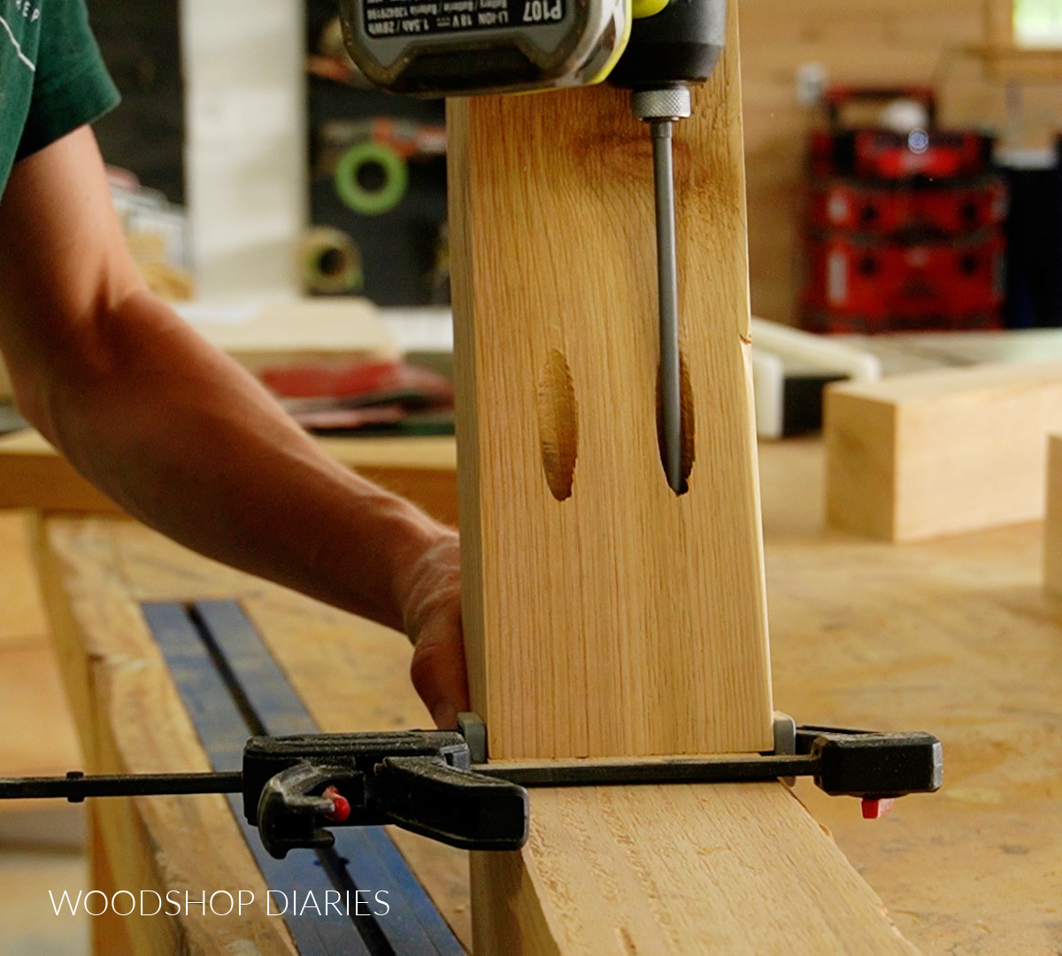 Close up of driving 4" pocket hole screws in cedar 4x4 post