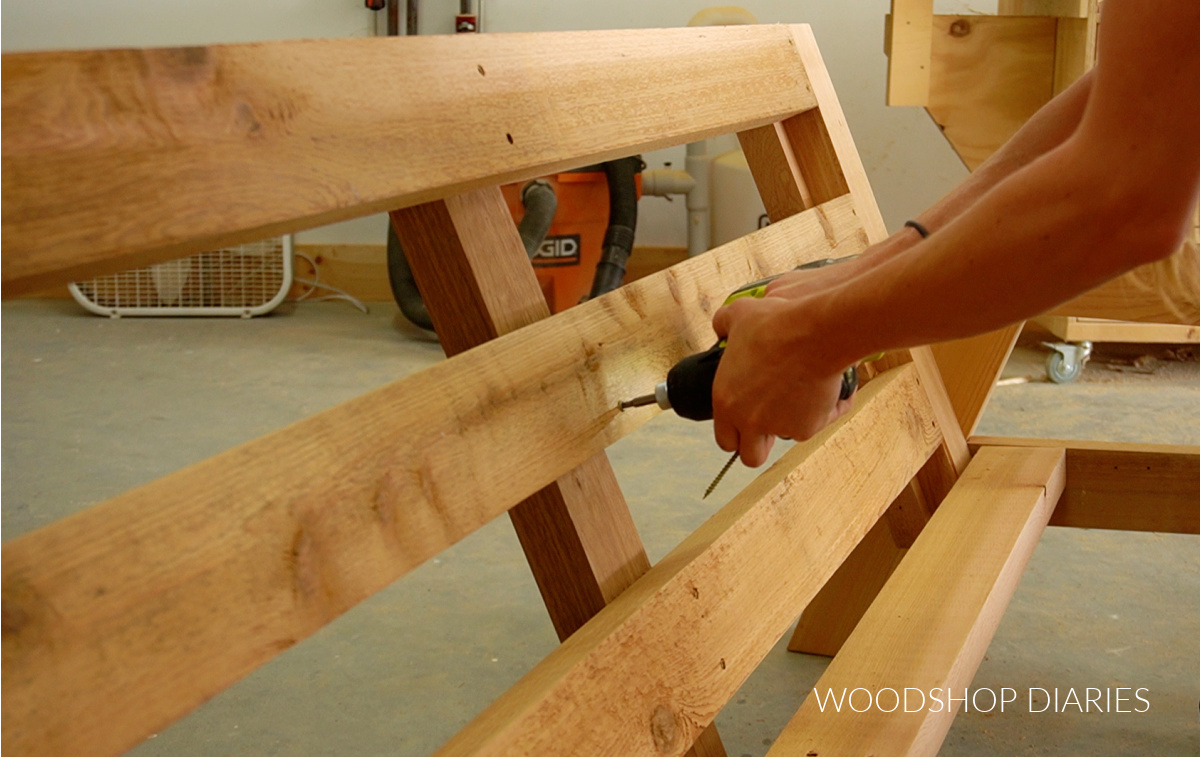 Driving screws to secure back slats on outdoor sofa