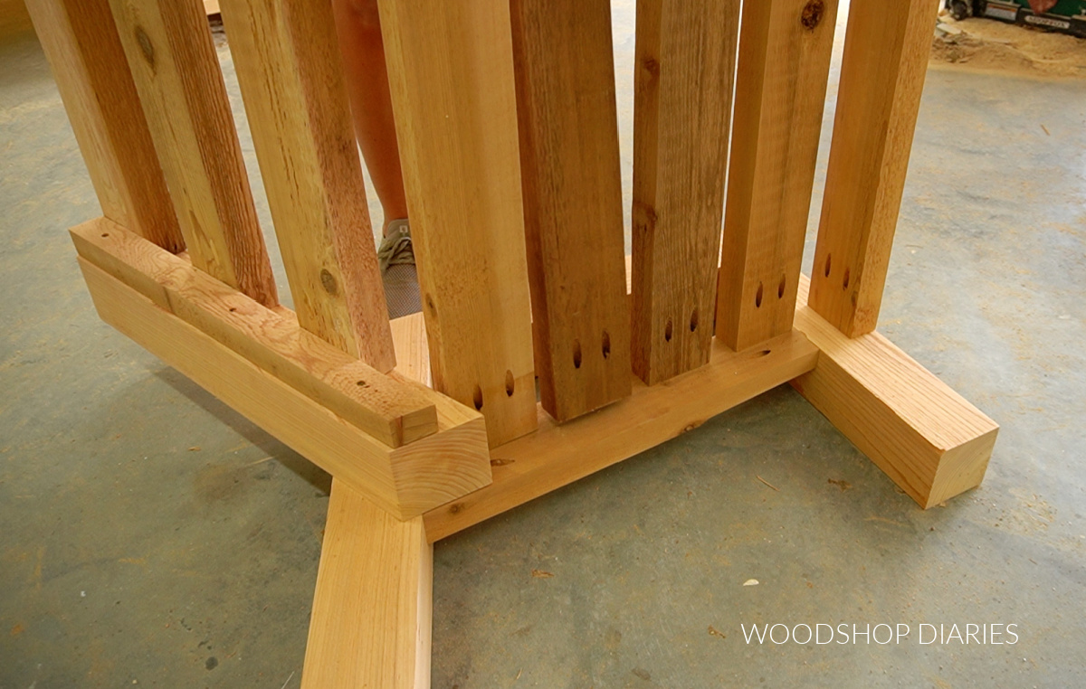 building outdoor couch--installing Seat slats evenly spaced on side frames with pocket holes drilled in ends