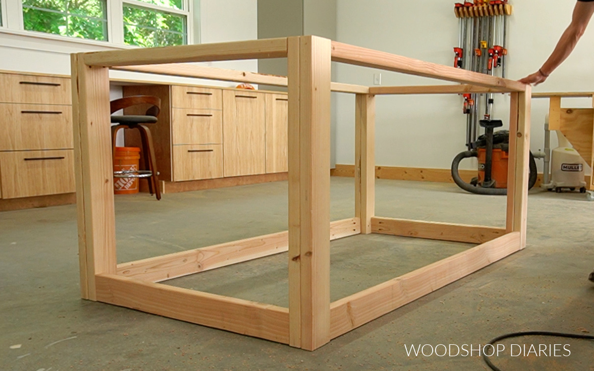 completed DIY workbench frame on shop floor assembled with pocket holes upside down