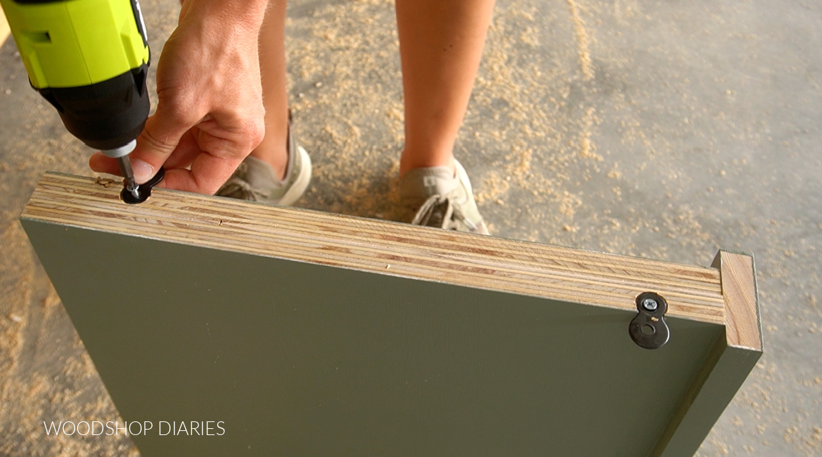 Close up of installing figure 8 fasteners on top of bench seat supports