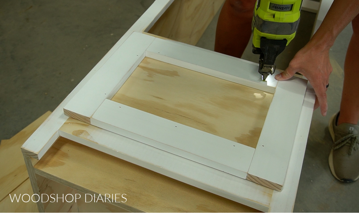 Glue and nail drawer front onto drawer box of mudroom cabinet