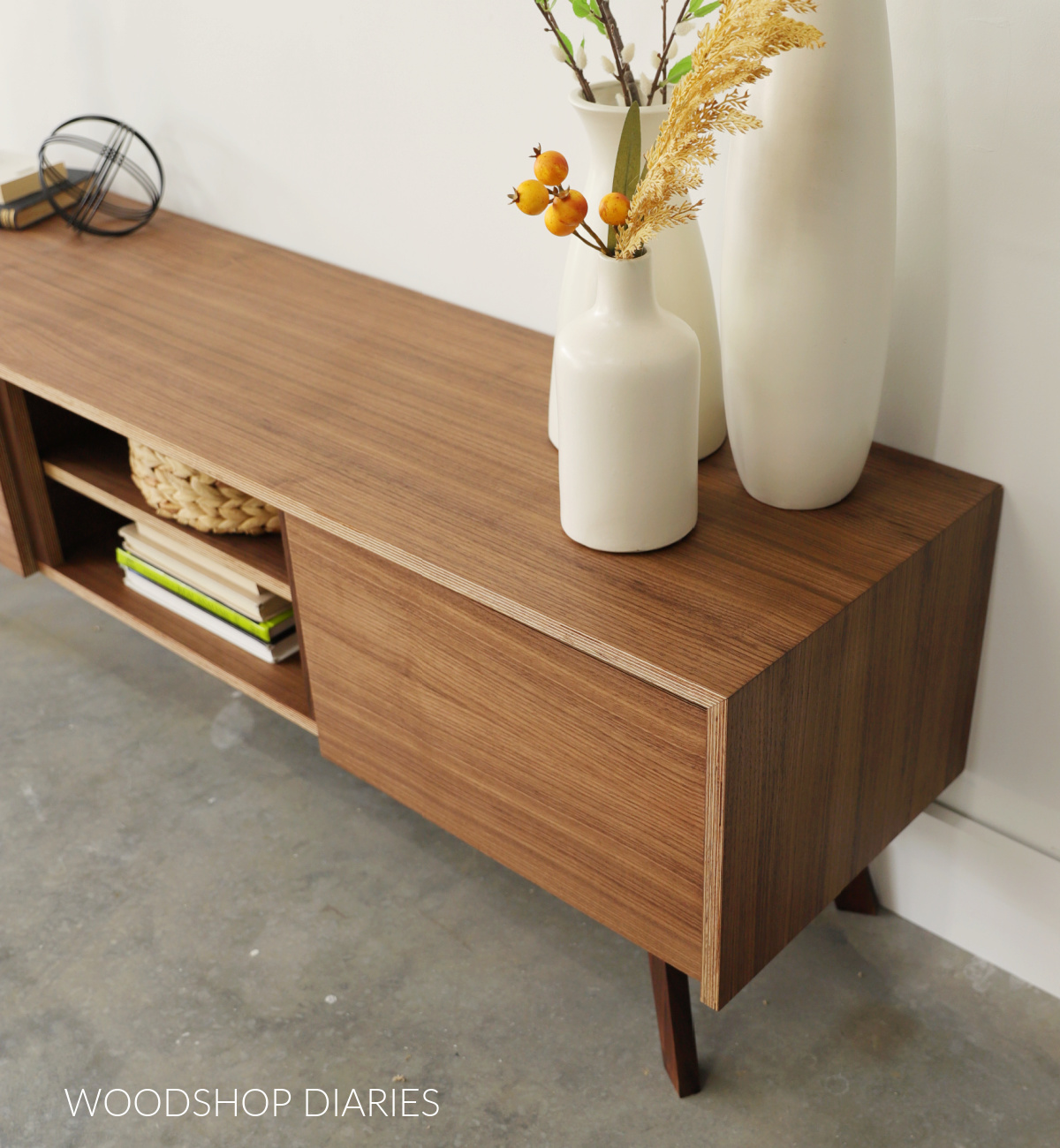 Close up of continuous grain on mid century modern plywood console