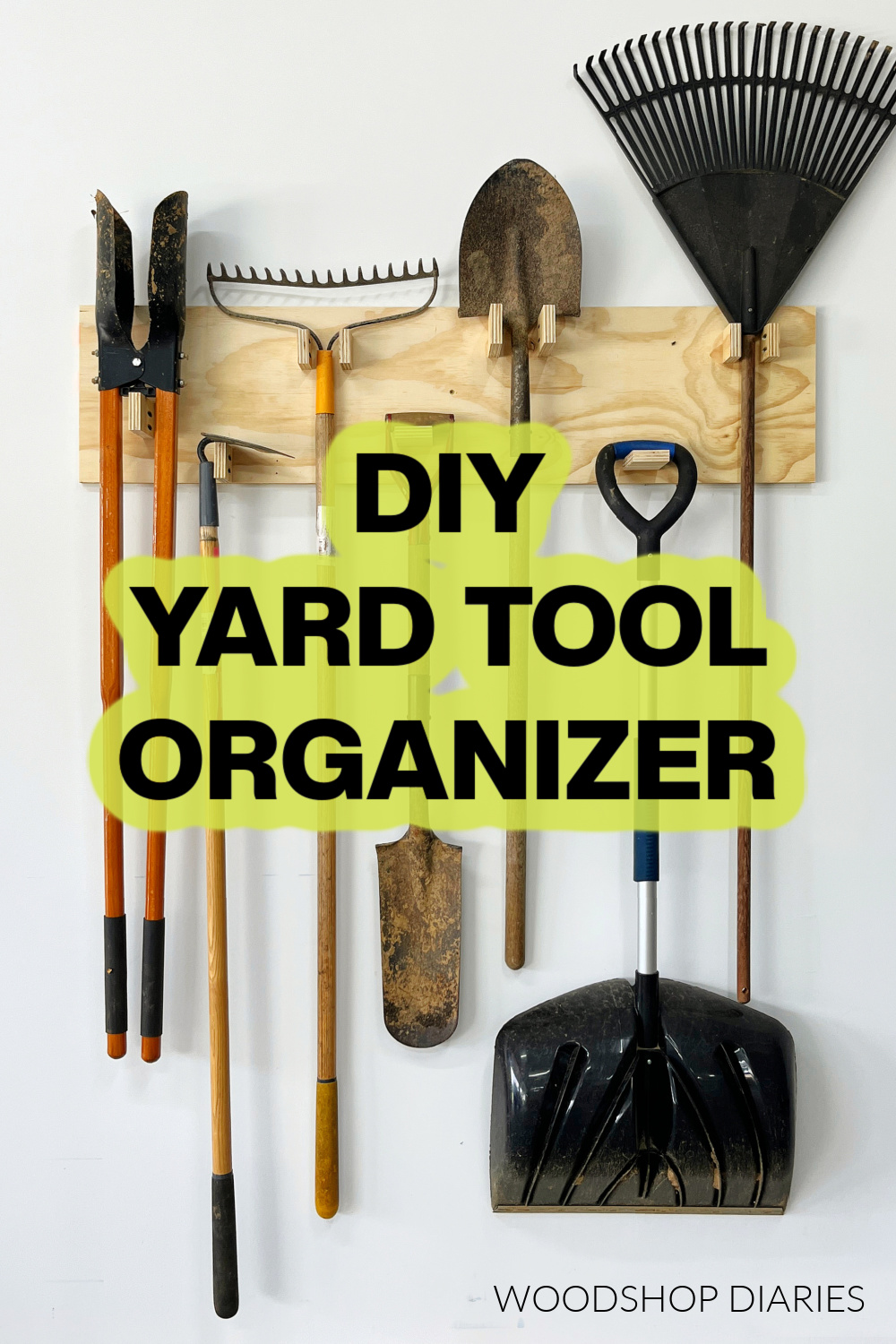 Pinterest image showing yard tool organizer hanging on white wall with text "DIY yard tool organizer" in green outline in center