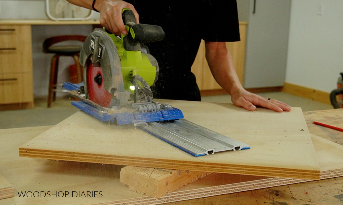 Shara Woodshop Diaries cutting plywood side panels using circular saw and Kreg Accu-Cut