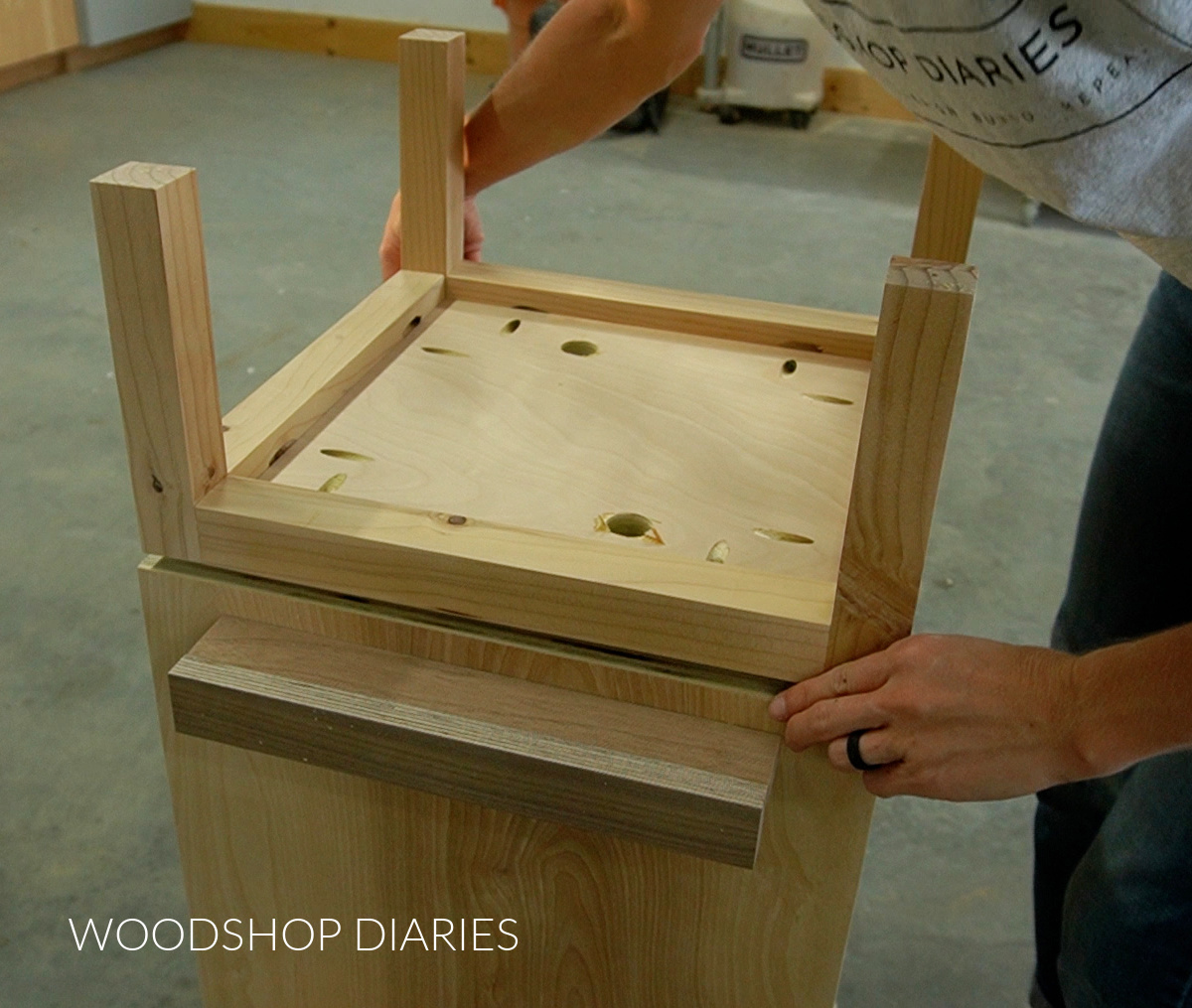 Shara Woodshop Diaries placing base on bottom of bookshelf box