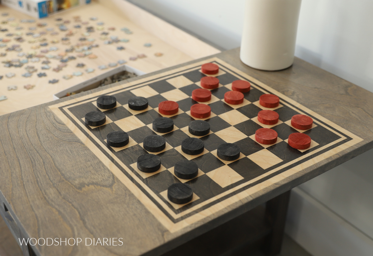 wood dowels cut and stained for checkers on board game table