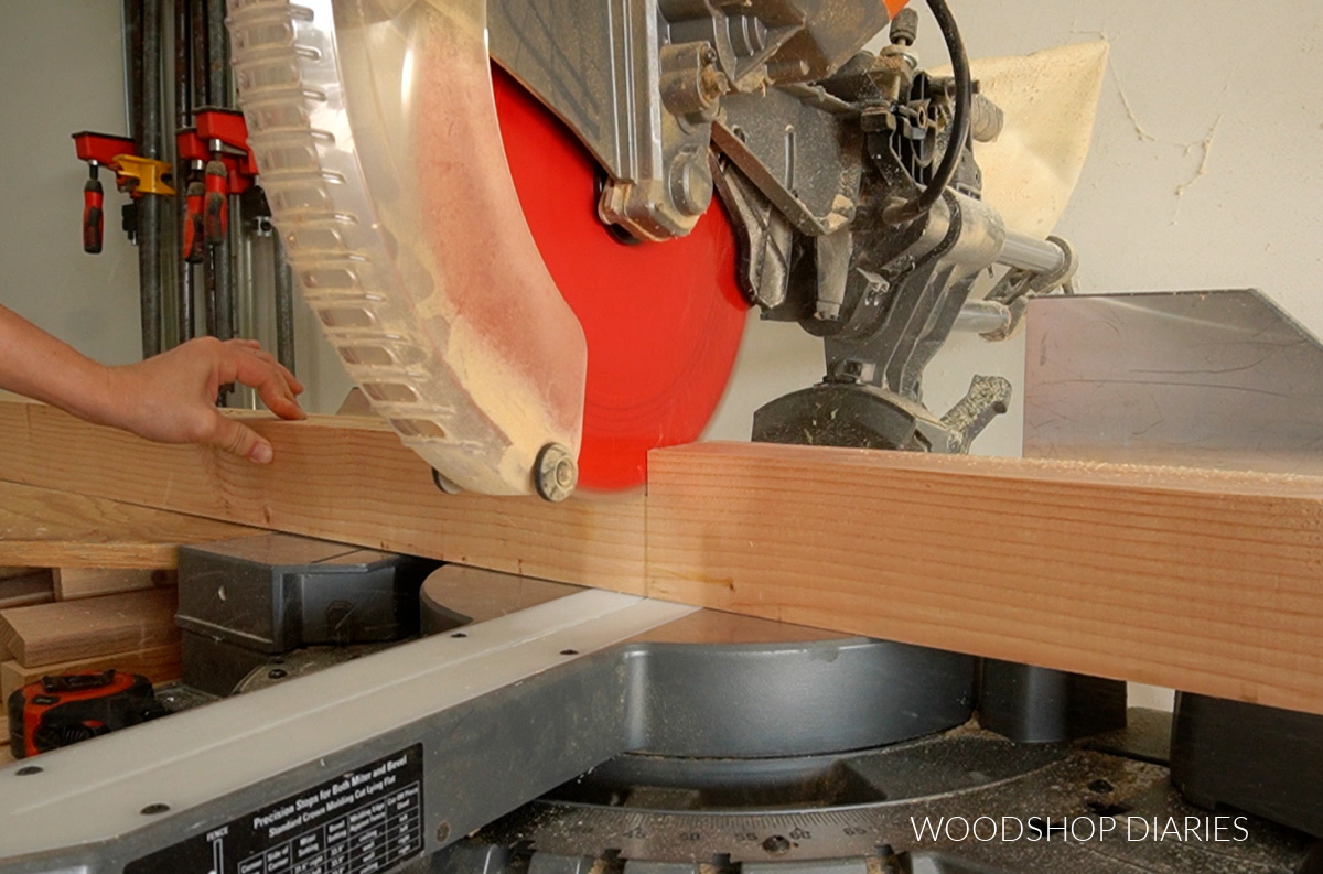 Miter saw cutting 3" square post to make shoe bench legs