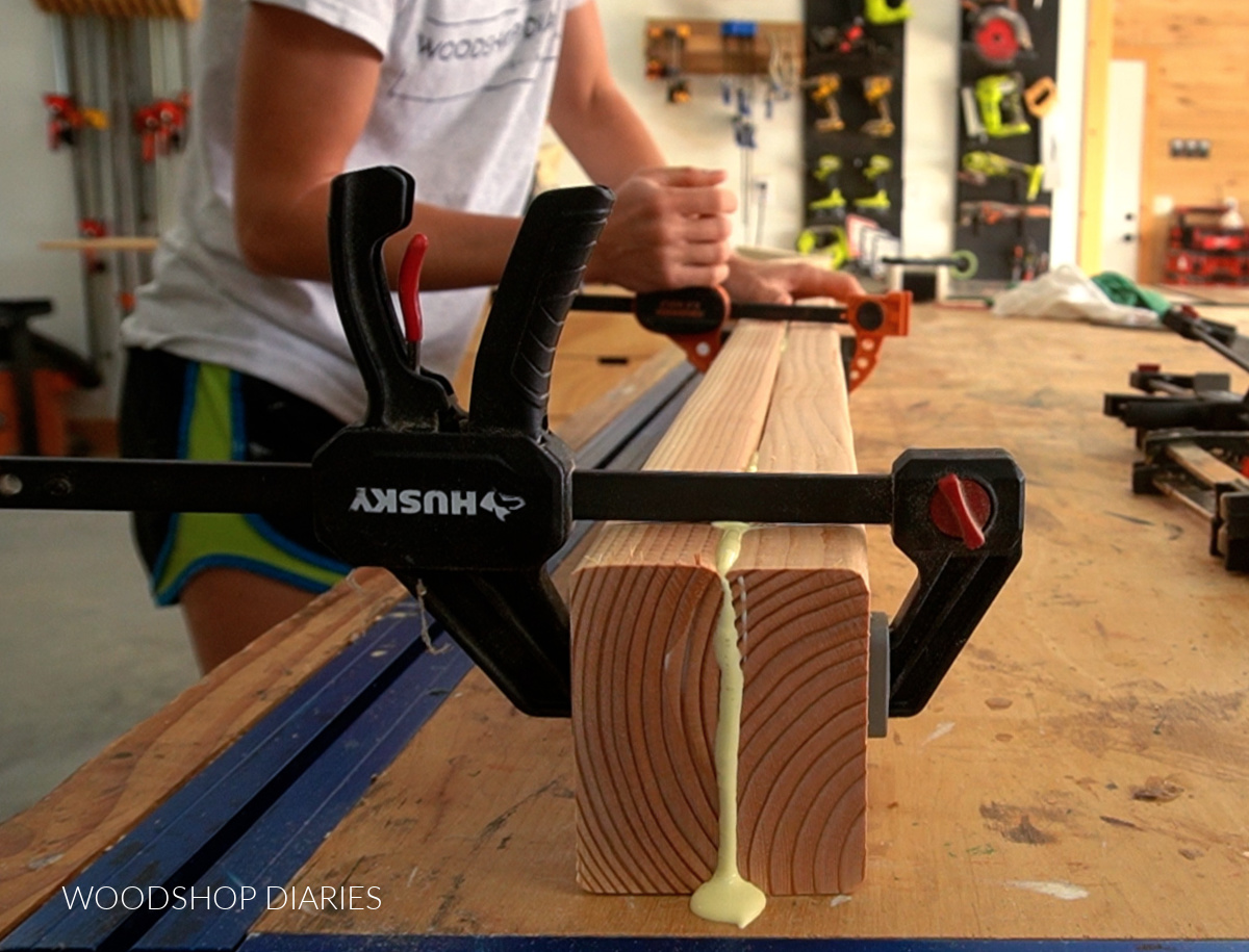 Clamping 2x4s together on workbench to make bench legs