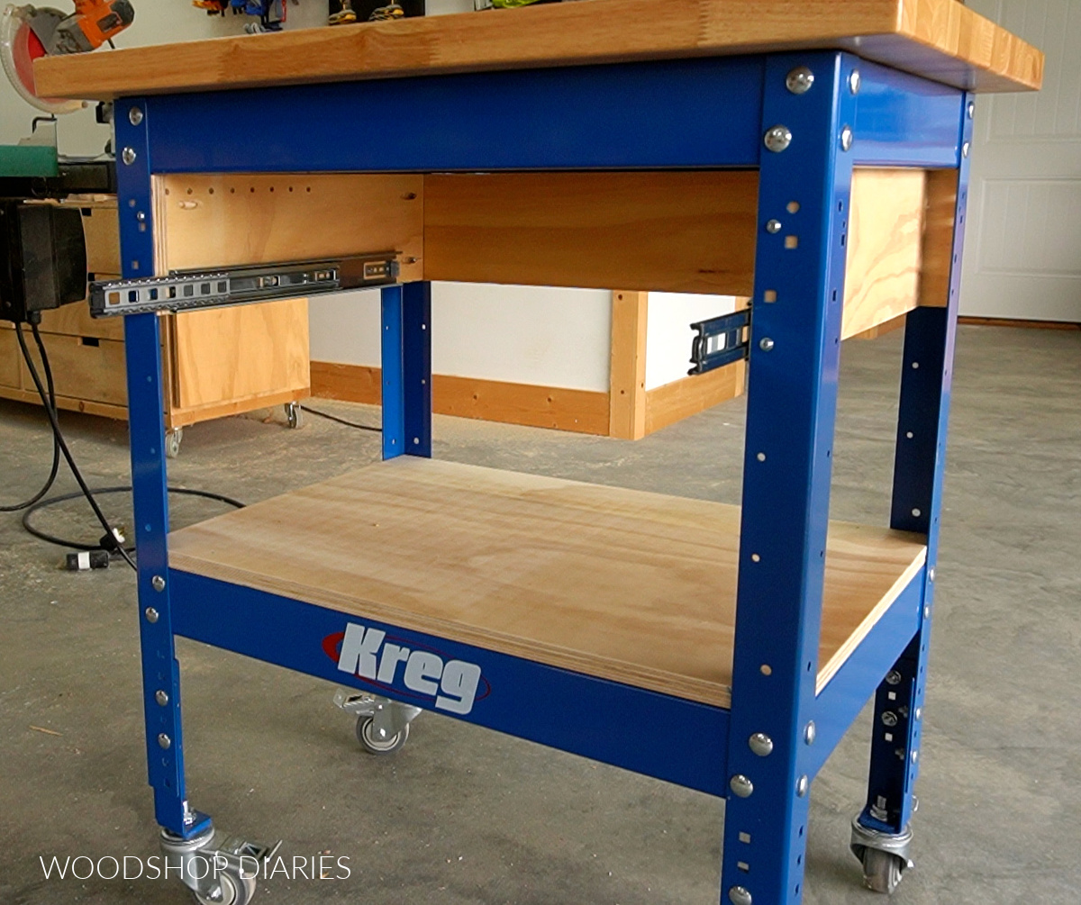 Workbench frame with plywood panel installed as bottom shelf
