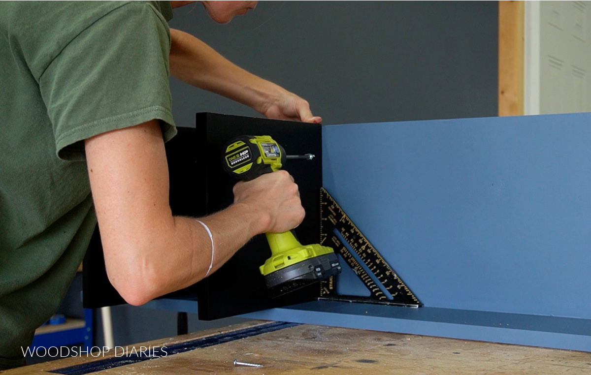 Shara Woodshop Diaries installing solid shelves on left side of shoe organizer