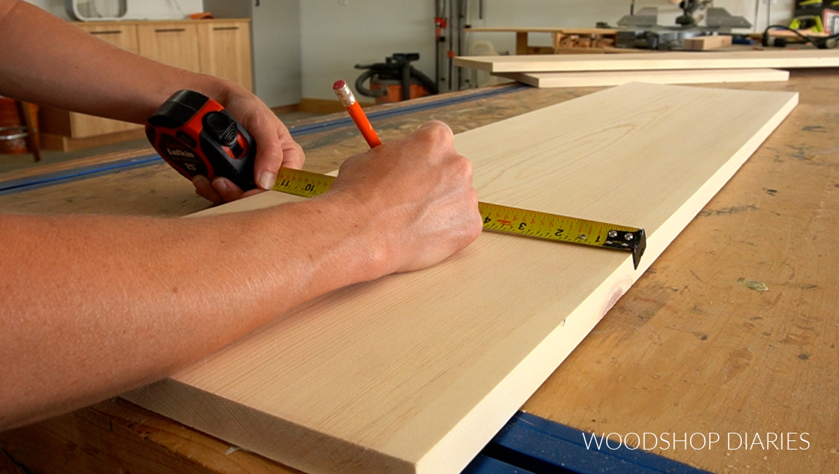 marking centerline of back shoe organizer board on workbench