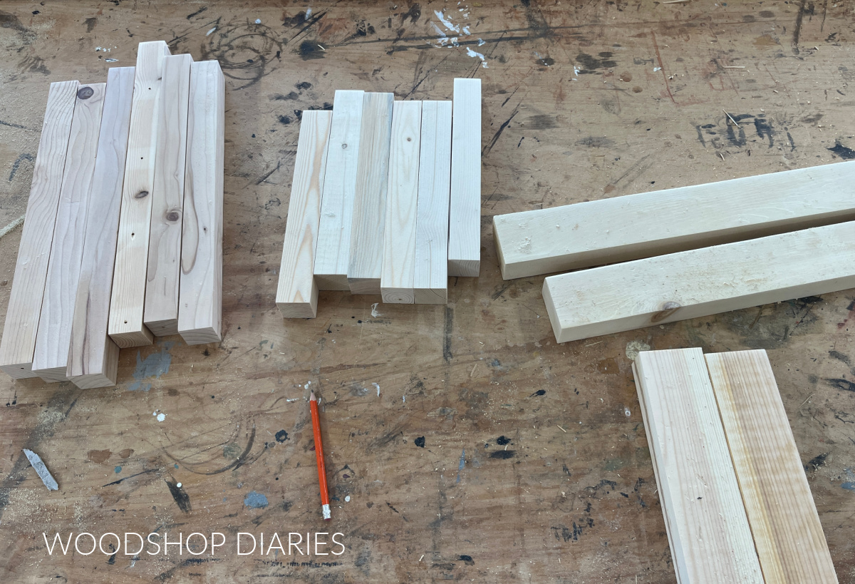 Pieces cut on workbench to assemble scrap wood boot rack