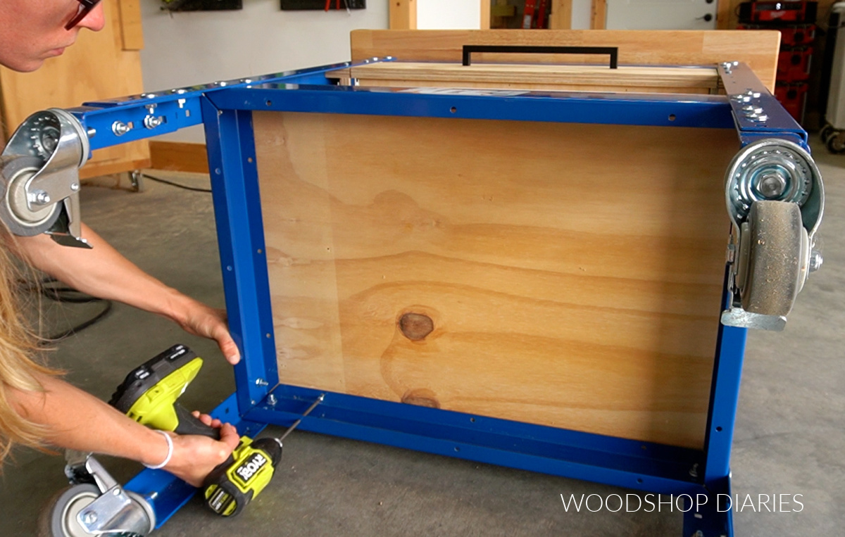 Using screws from underside to secure plywood shelf to bottom of workbench bracing