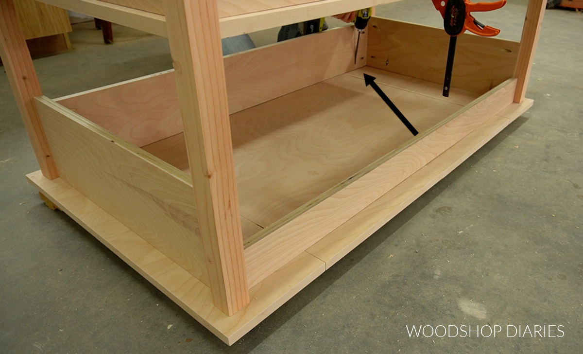 attaching the flip top to the coffee table base