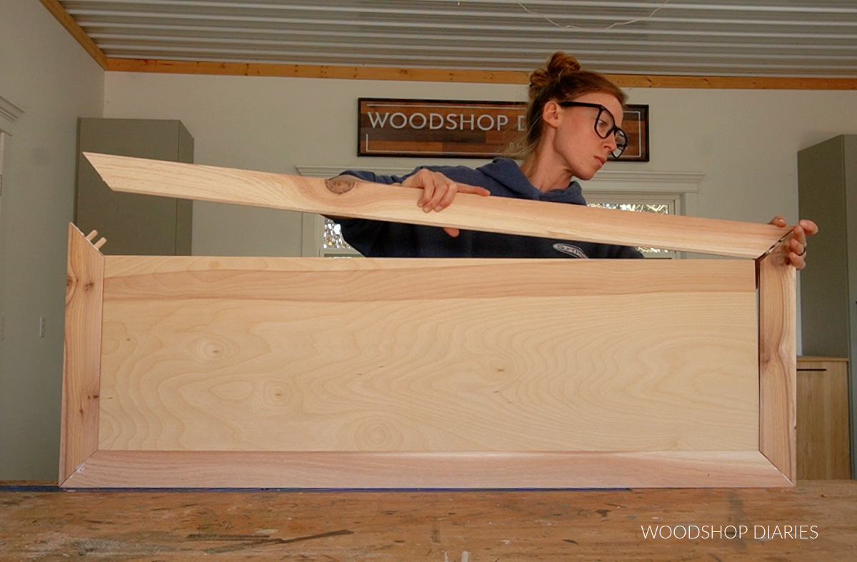 Assembling cabinet door using wood dowels with board ends mitered 45 degrees