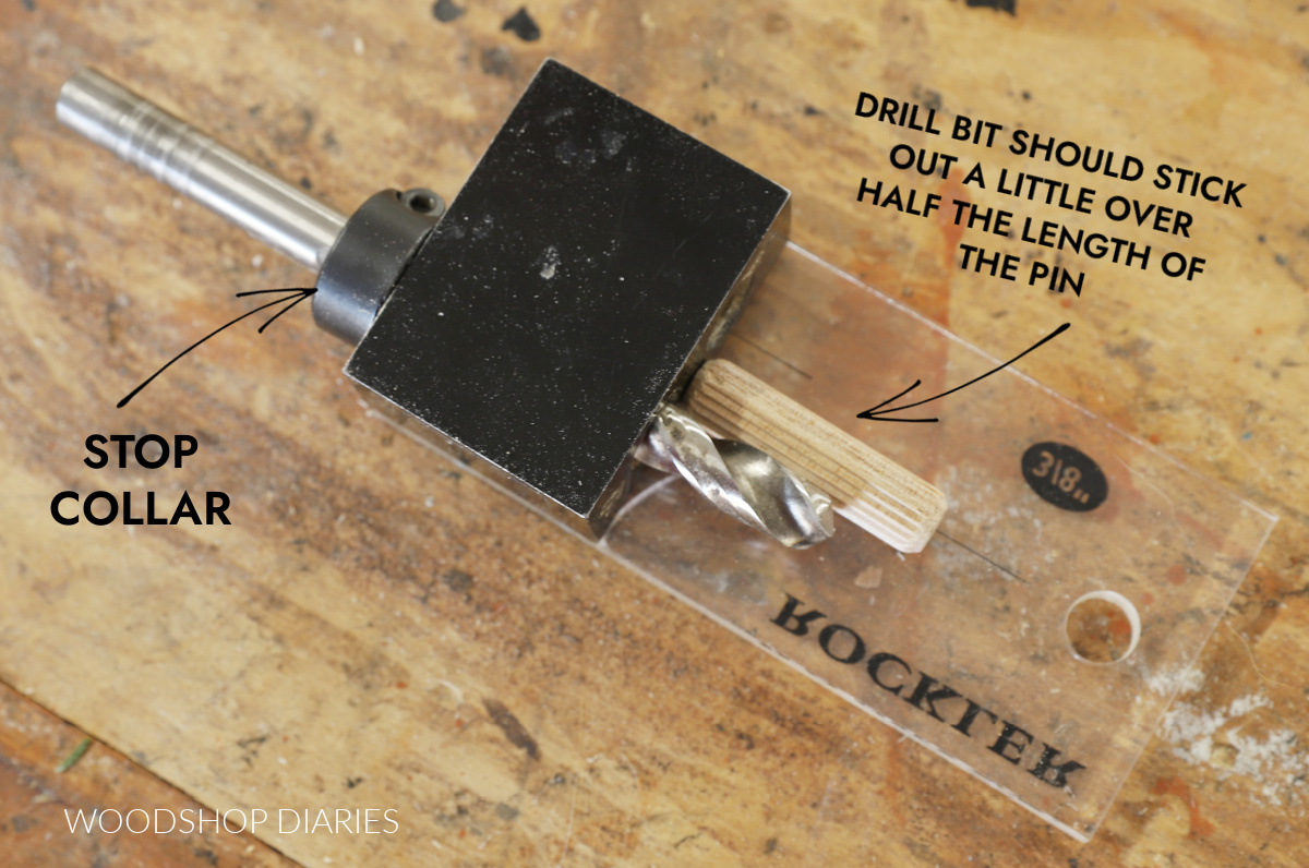 close up of dowel jig with drill bit inserted showing stop collar and drill depth compared to dowel pin