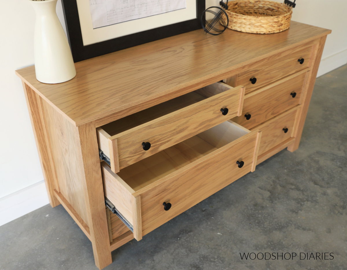 6 drawer dresser completed with top and middle drawer open slightly