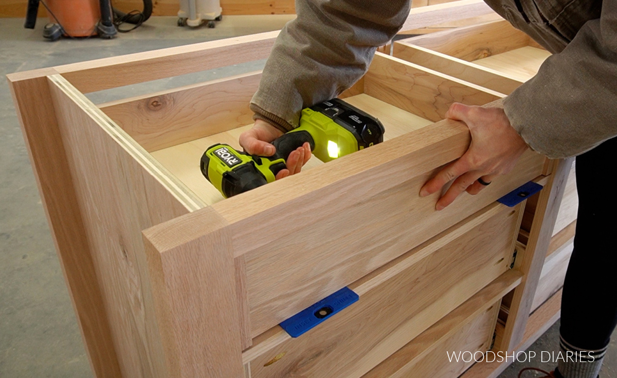 Screwing drawer front onto drawer box from inside