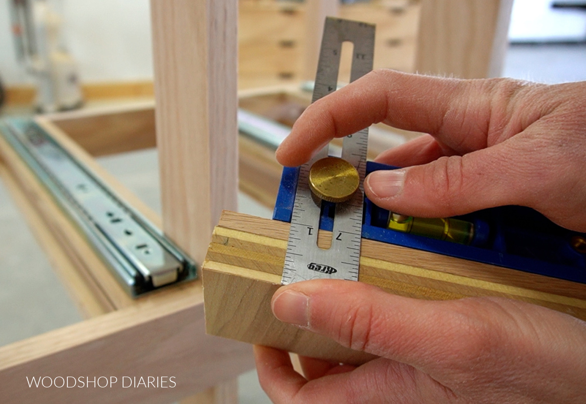 using a MultiMark tool to gauge drawer front thickness