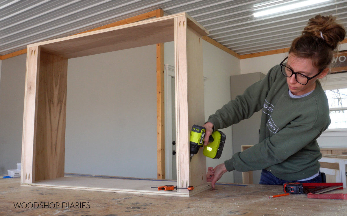 Shara Woodshop Diaries assembling upper cabinet box on workbench