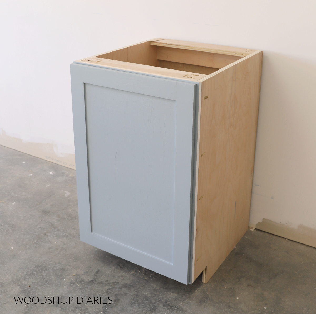 base cabinet box with shaker style cabinet door on front