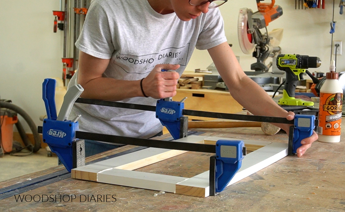 Shara Woodshop Diaries clamping 1x3 door frame together with dowel pins