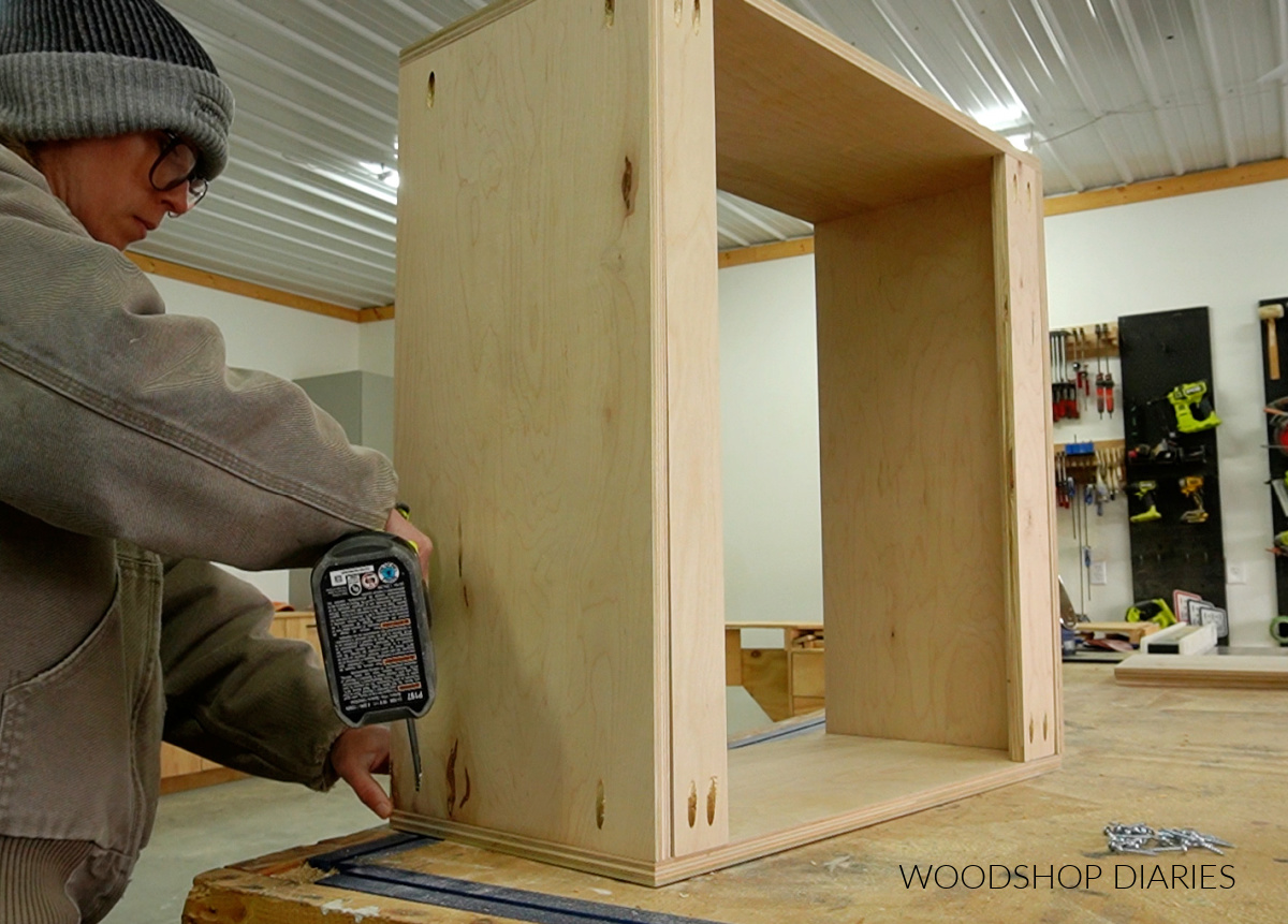Shara Woodshop Diaries assembling bathroom wall cabinet on workbench with pocket hole screws