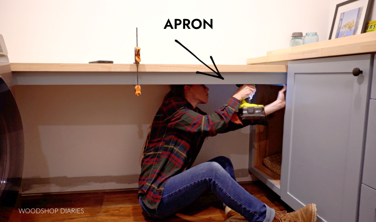 Shara Woodshop Diaries installing apron underneath countertop in laundry room