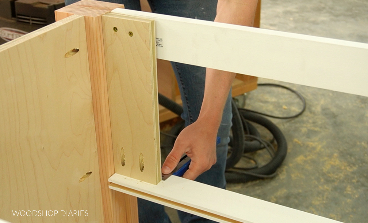 Faux drawer front supports installed into top of bathroom vanity